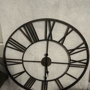 Vintage-Inspired Black and Brown Roman Numeral Wall Clock 30in wide Metal frame